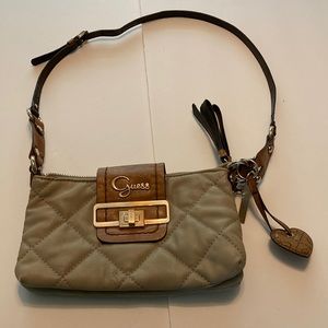Slightly use guess handbag Beige leather
